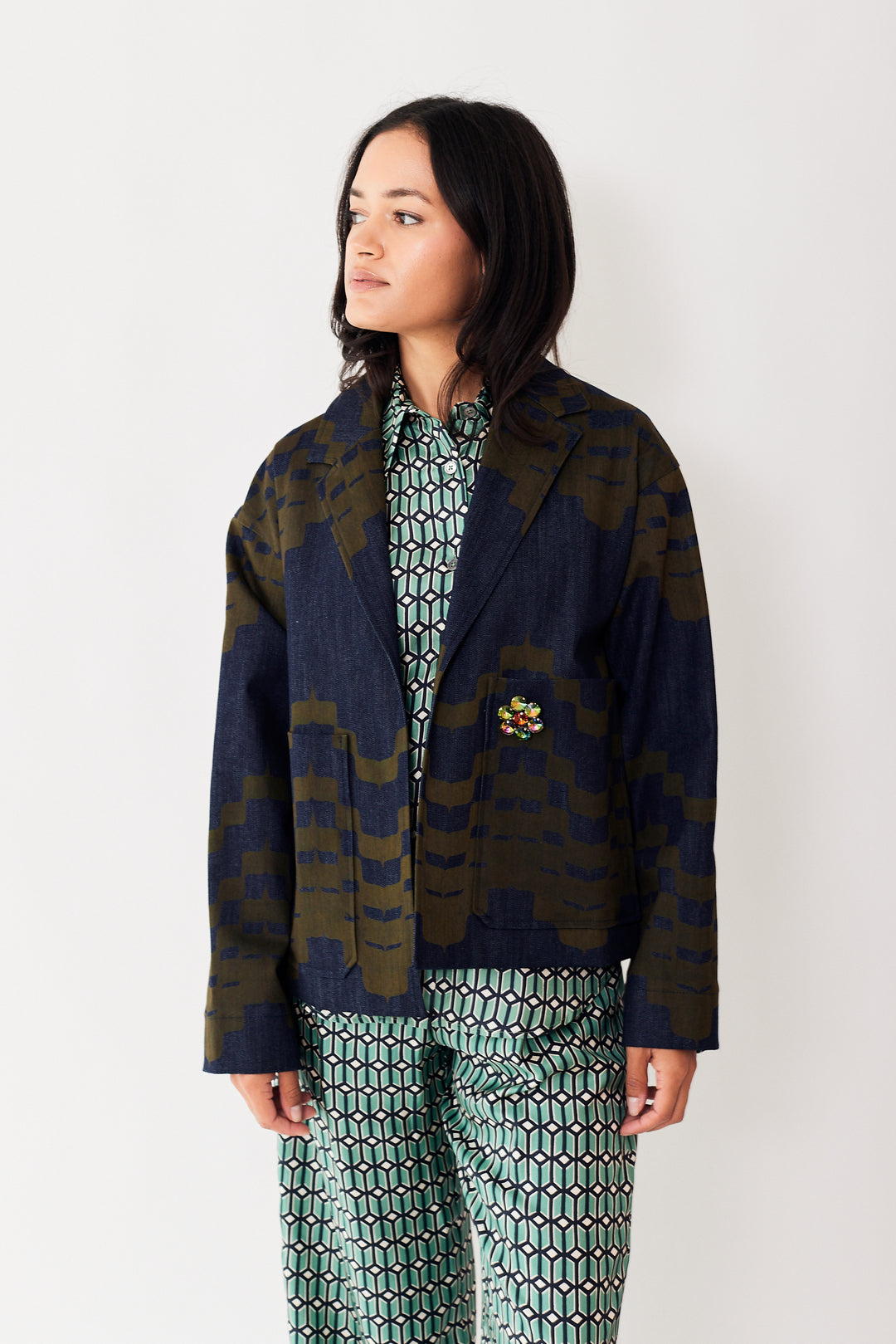 Amanda wearing Odeeh Printed Indigo Open Jacket With Pocket Zazz Brooch front view