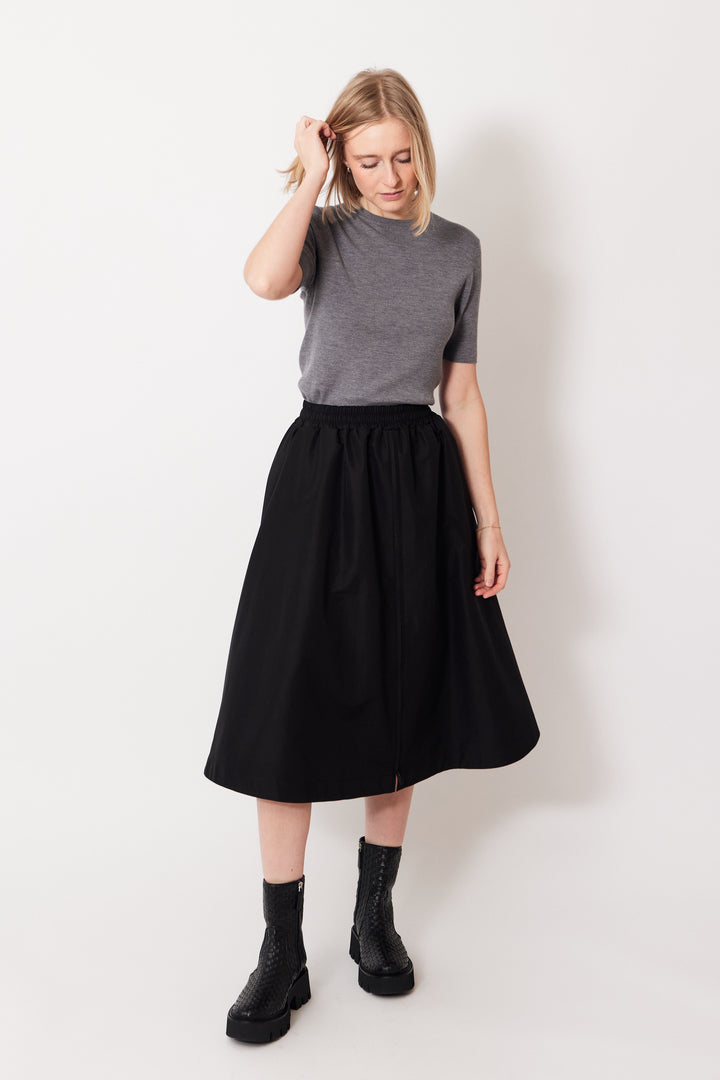 Madi wearing Golden Goose Zip Front Circle Skirt In Tech Nylon front view