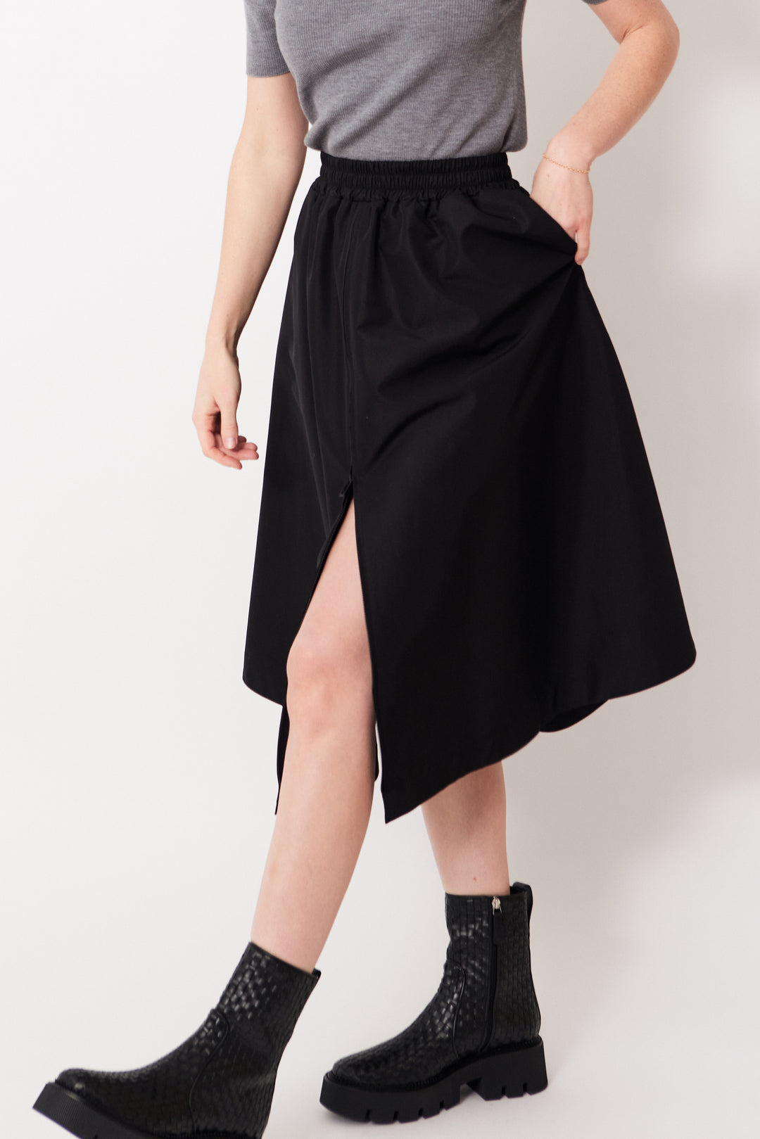 Madi wearing Golden Goose Zip Front Circle Skirt In Tech Nylon front/side view