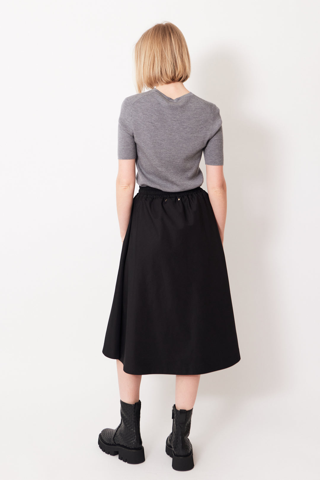 Madi wearing Golden Goose Zip Front Circle Skirt In Tech Nylon rear view