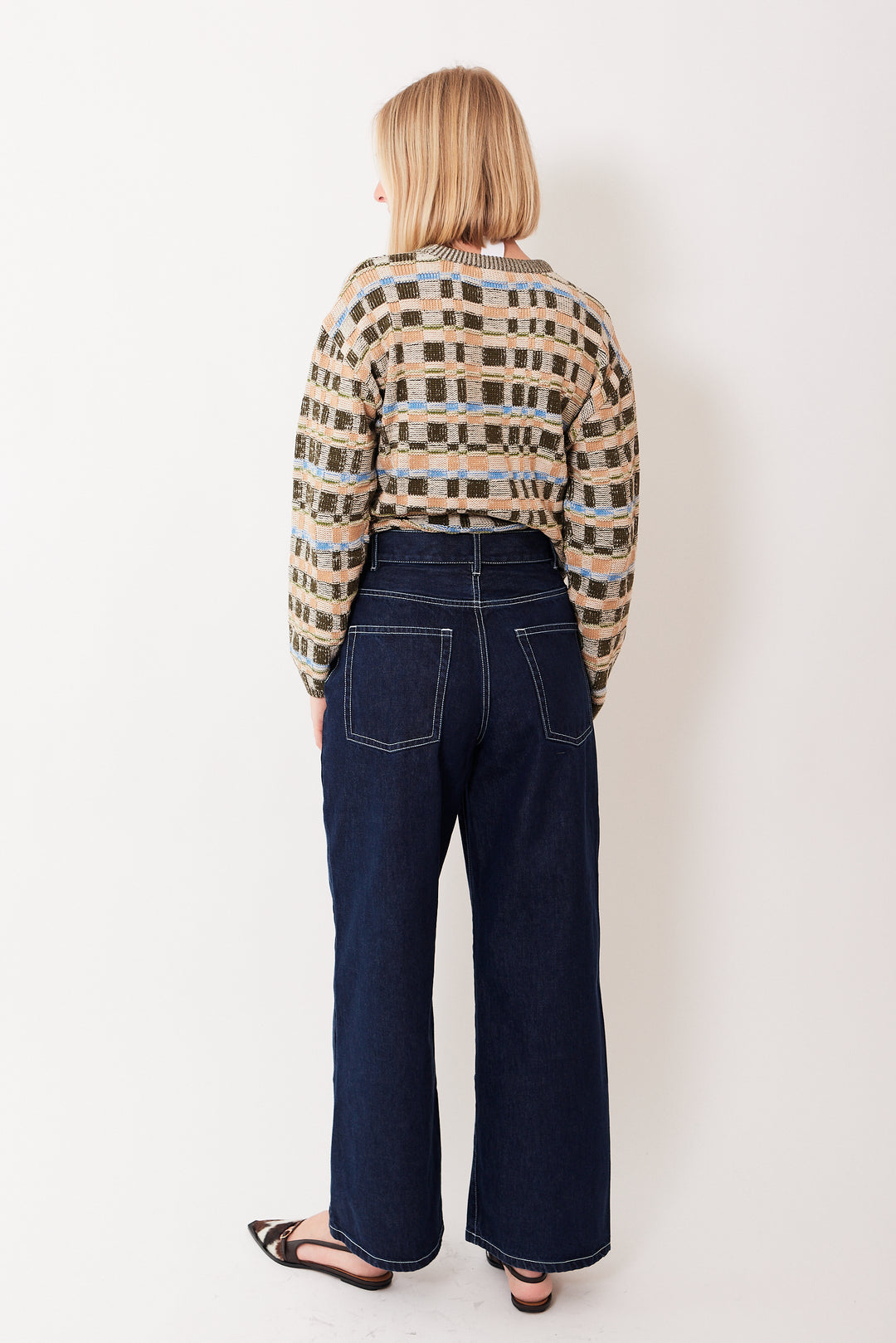 Madi wearing Kowtow Sailor Jeans rear view