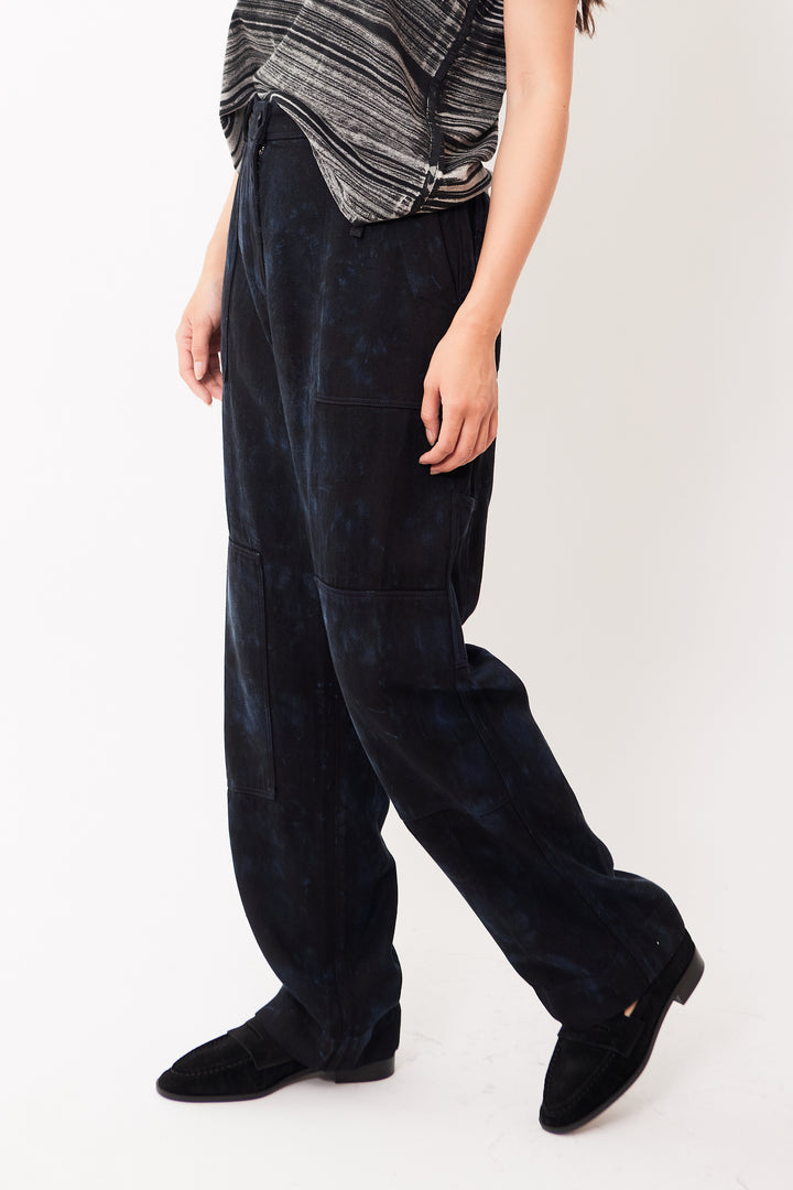 Madelyn wearing Raquel Allegra Work Pant front/side view