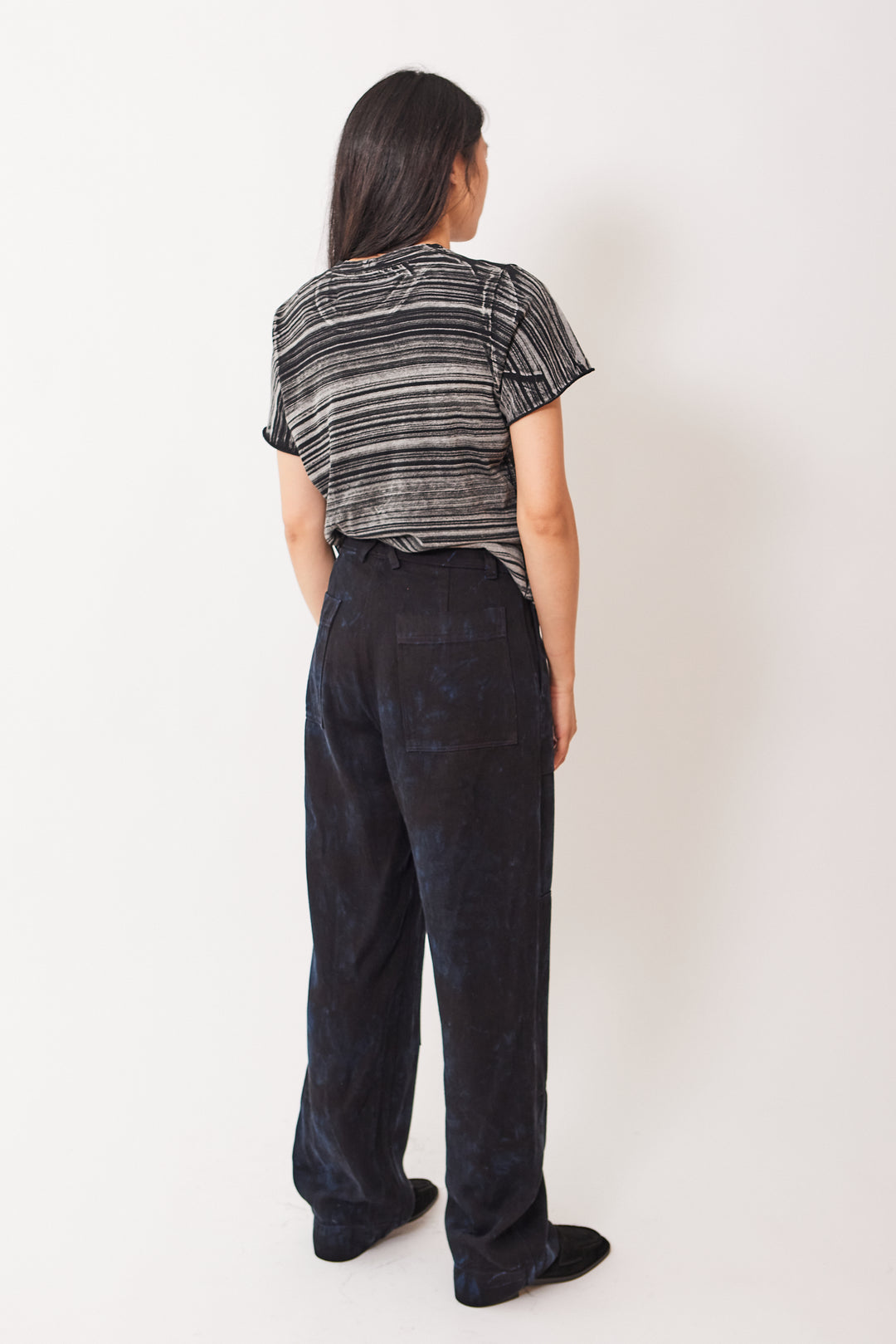 Madelyn wearing Raquel Allegra Work Pant rear view