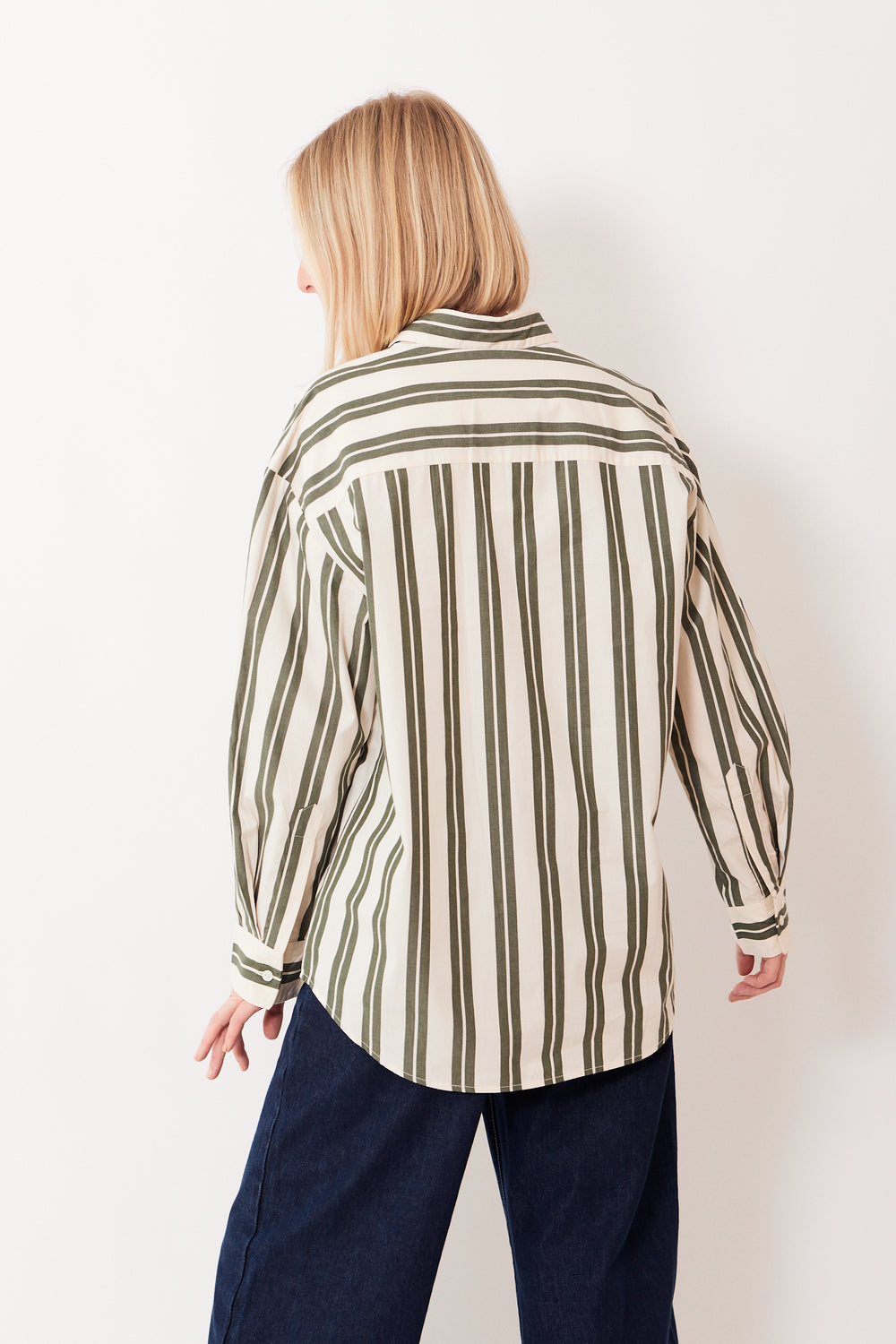 Madi wearing Kowtow Petra Shirt rear view