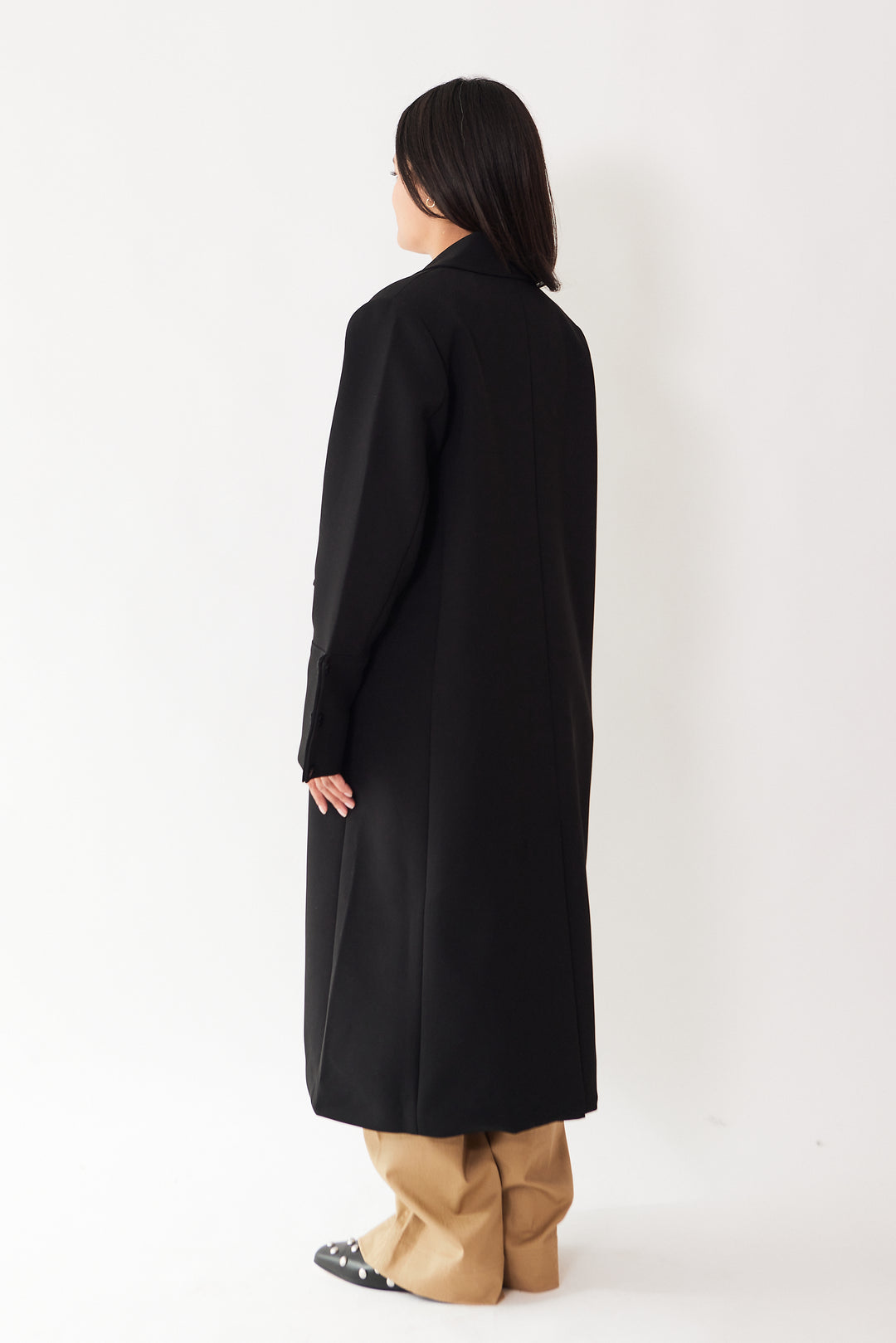 Amanda wearing Ganni Bonded Crepe Coat rear view