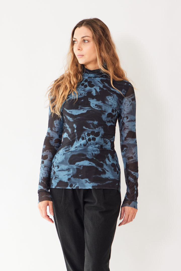 Mari wearing Ganni Printed Mesh Long Sleeve Rollneck front view