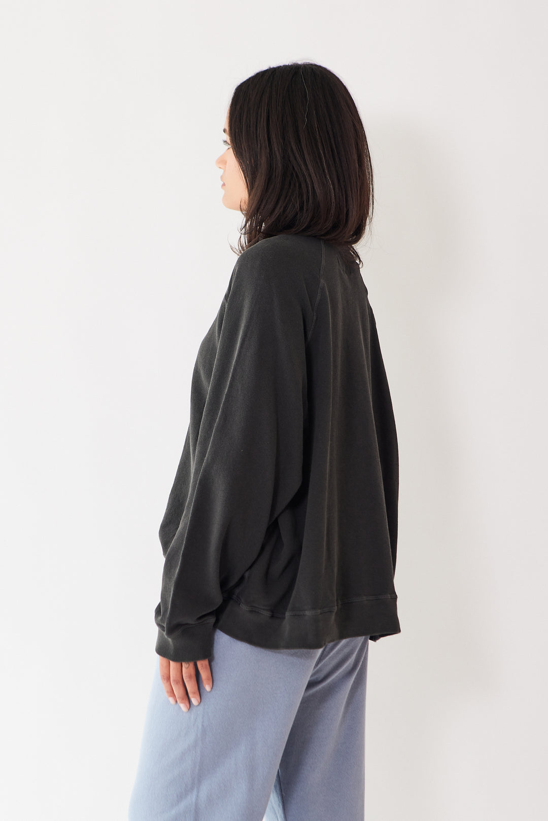 Amanda wearing The Great The Slouch Sweatshirt rear view