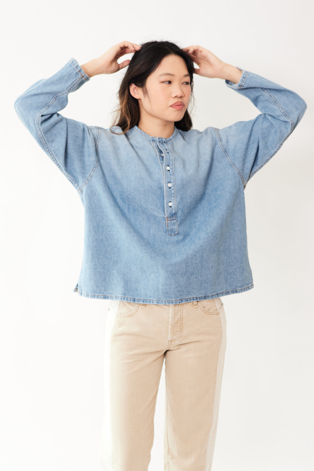 Madelyn wearing ASKK NY Denim Henley front view