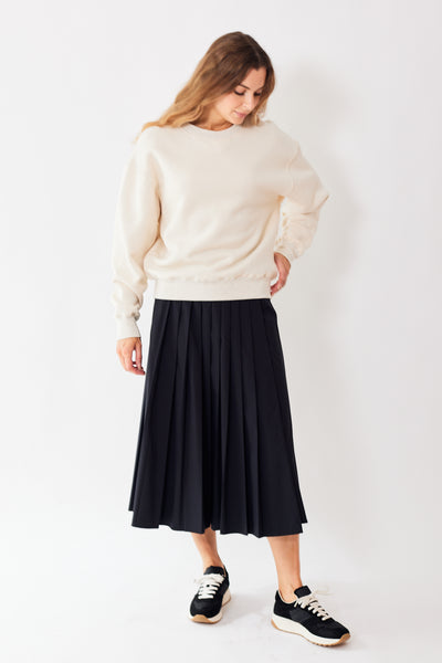 Mari wearing 6397 Pleated Wrap Skirt front view