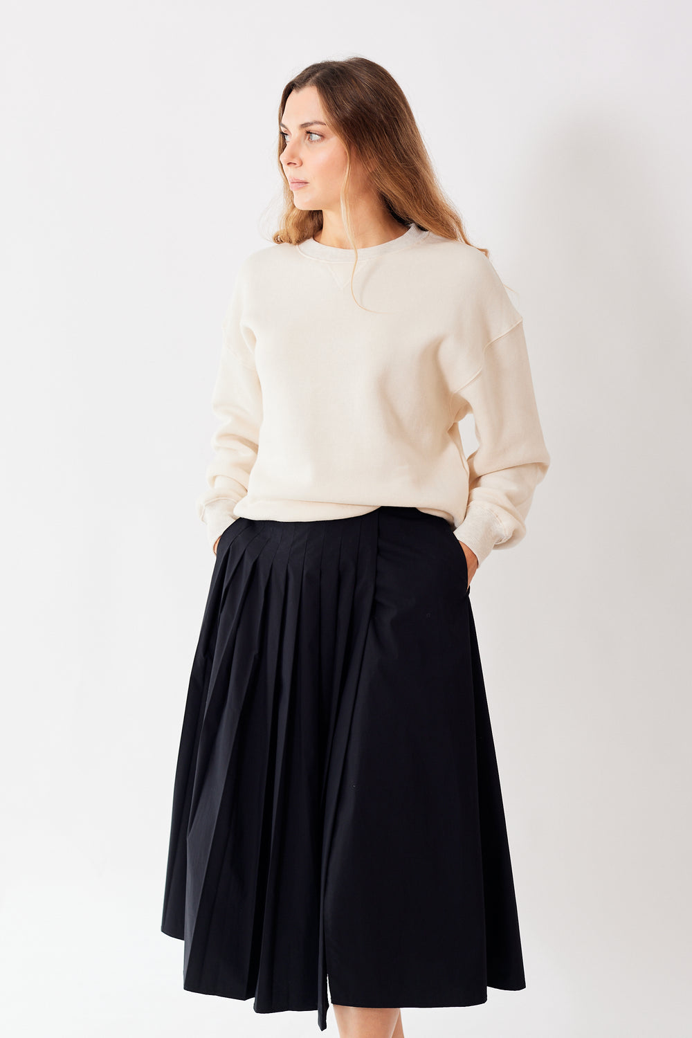 Mari wearing 6397 Pleated Wrap Skirt front view