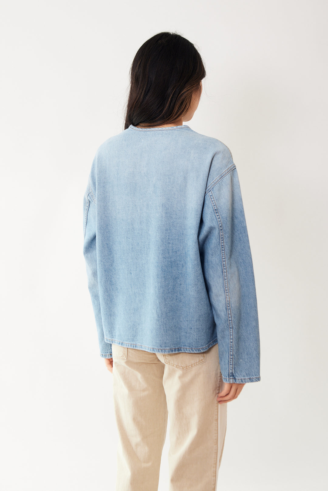 Madelyn wearing ASKK NY Denim Henley rear view