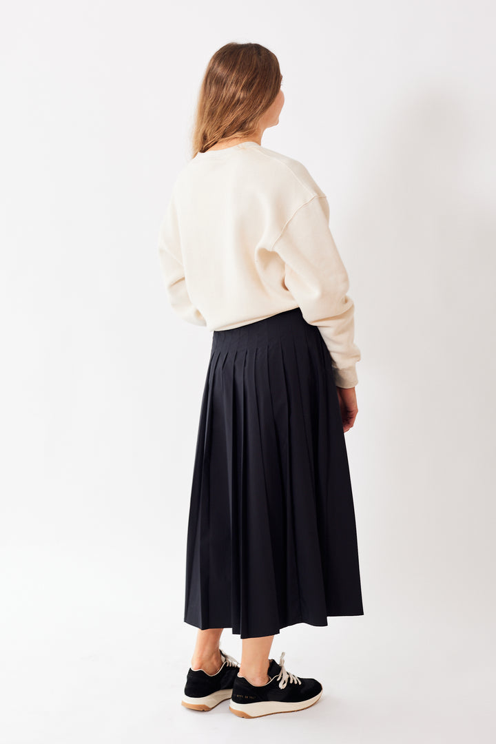 Mari wearing 6397 Pleated Wrap Skirt rear view