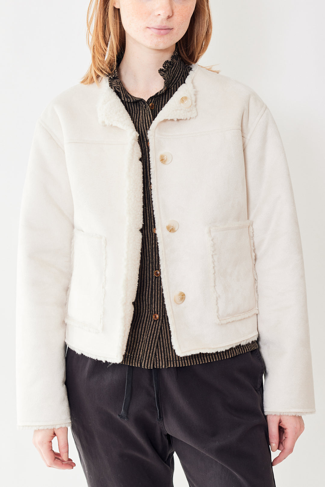 Close up of Xirena Thayer Suede jacket on model.